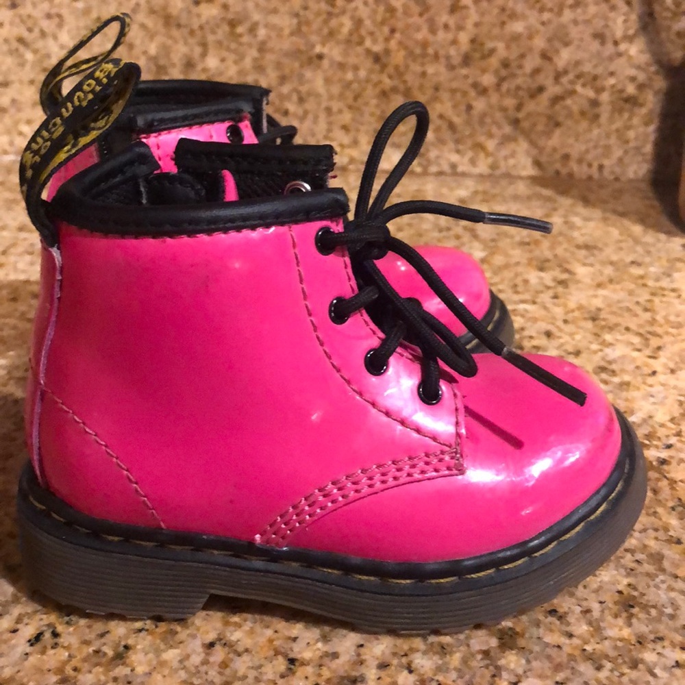 Bright pink Dr Marten toddler boots